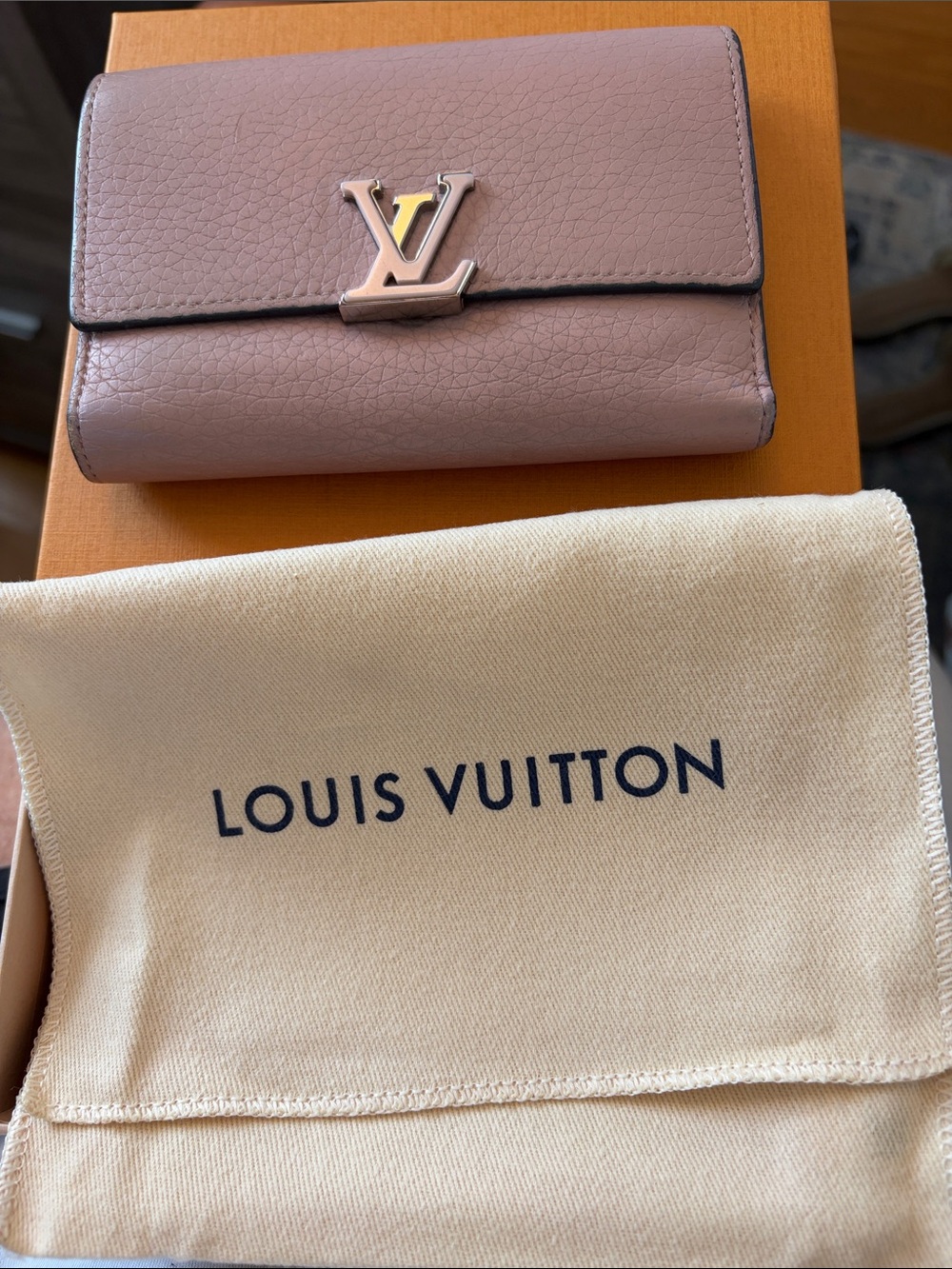 Louis Vuitton Capucines Mauve Pink Compact Leather Wallet with LV Metal Logo